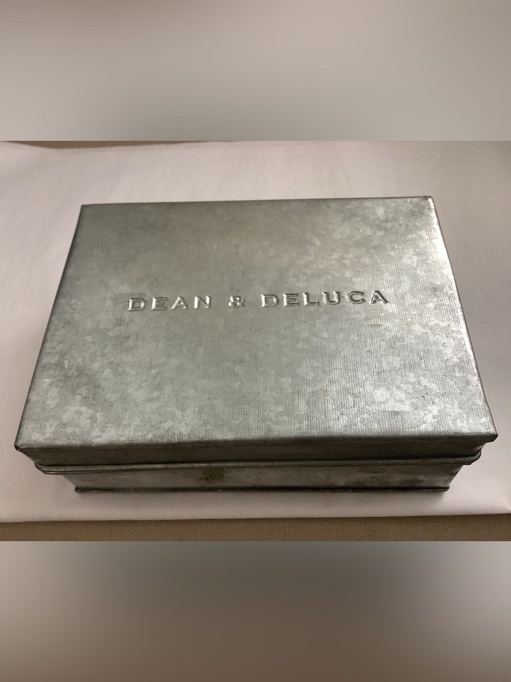Dean and DeLuca Galvanized Tin, most likely had herbs,spices or teas in it.